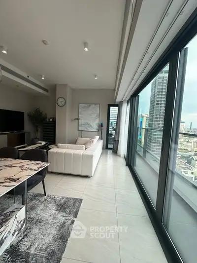Luxurious modern living room with panoramic city view and elegant decor