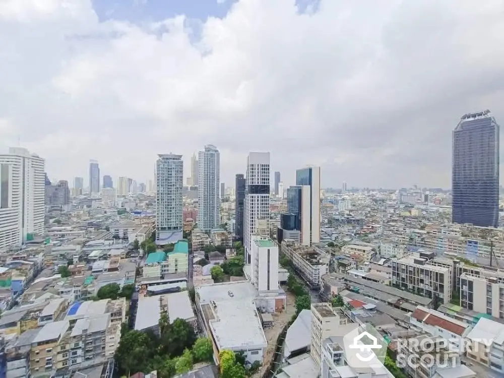 Stunning cityscape view showcasing modern skyscrapers and urban landscape under a cloudy sky.