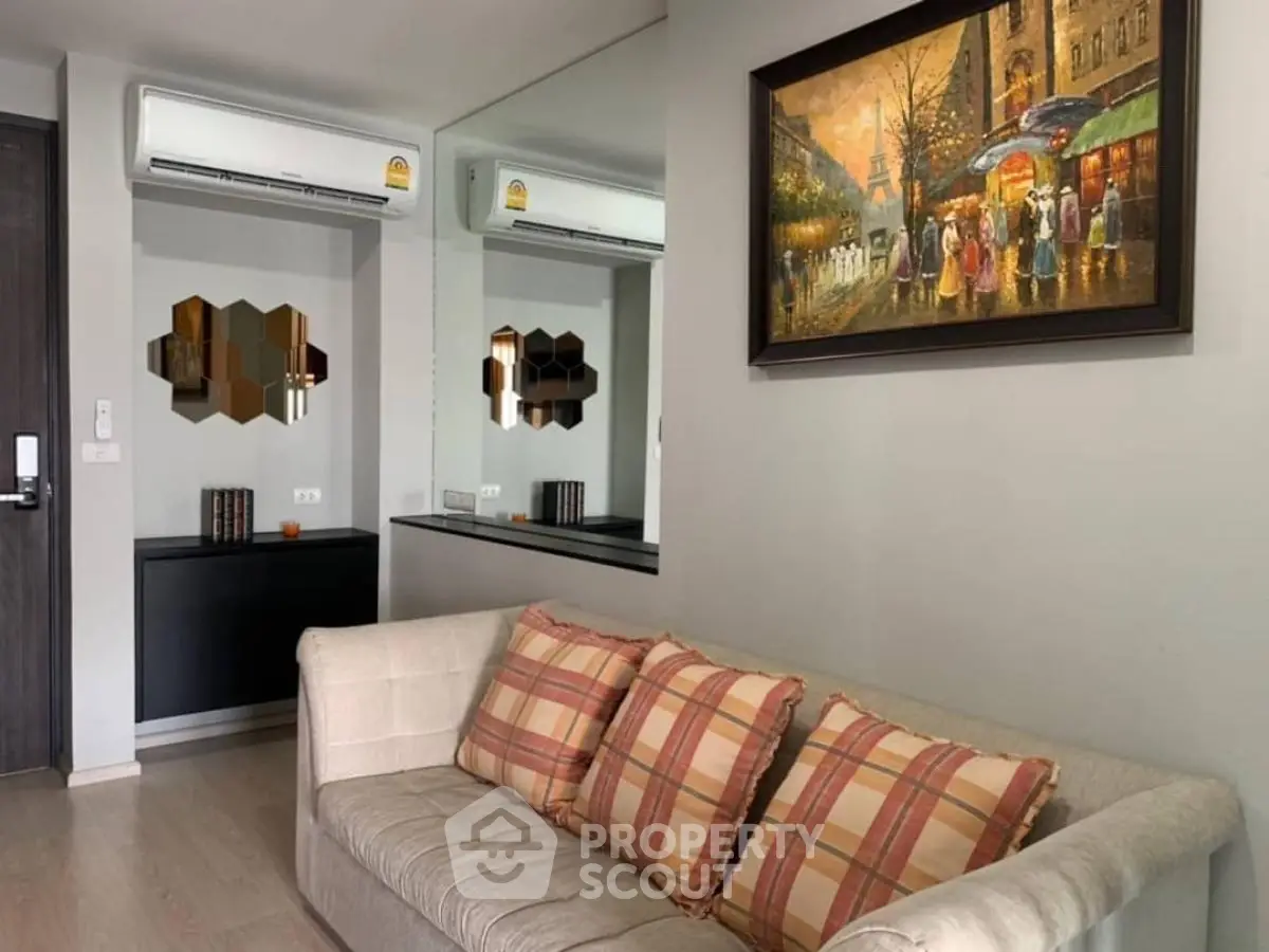 Cozy living room with modern decor and stylish wall art