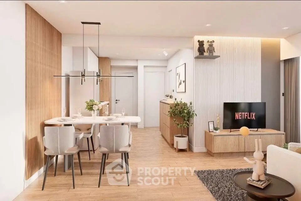 Modern open-plan living and dining area with stylish decor and natural light.
