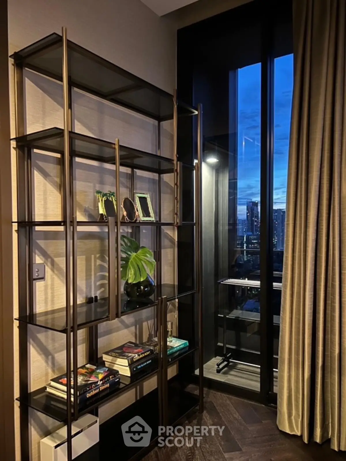 Stylish modern living room corner with elegant shelving and city view