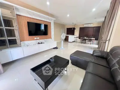 Spacious modern living room with sleek furniture and open layout