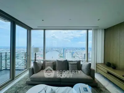 Luxurious living room with panoramic city view and elegant decor