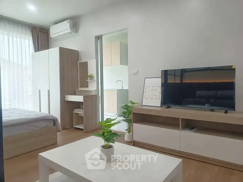 Modern studio apartment with stylish decor and natural light