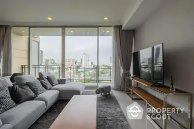 Spacious modern living room with city view and large windows