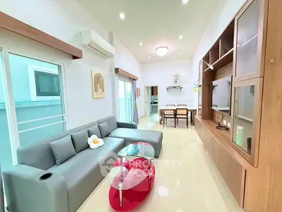 Spacious modern living room with sleek furniture and natural light