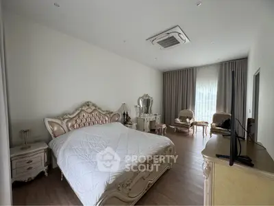 Luxurious bedroom with elegant furniture and natural light