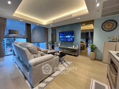 Luxurious modern living room with city view, featuring plush seating and ambient lighting.