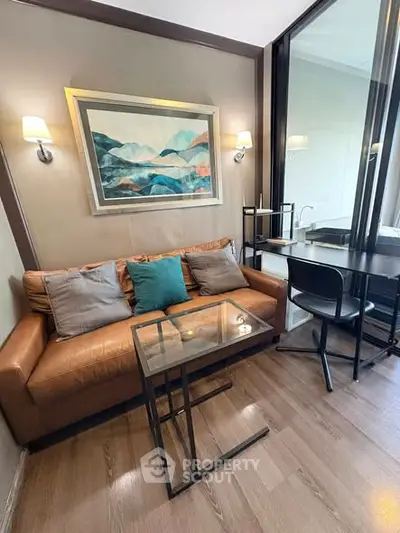 Modern living room with stylish decor and cozy seating area, perfect for relaxation and entertaining.