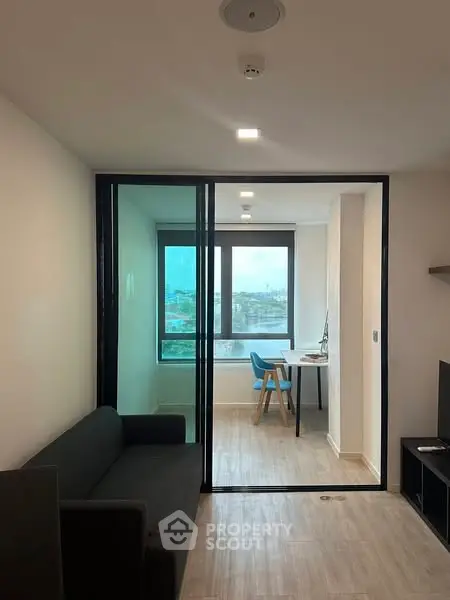 Modern apartment with glass partition and city view