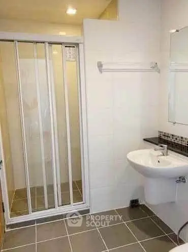 Modern bathroom with sleek shower and stylish sink