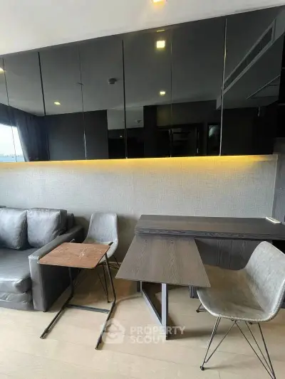 Modern living room with sleek furniture and ambient lighting