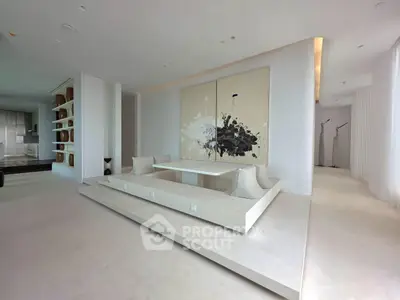 Luxurious minimalist living room with modern art and elegant seating area