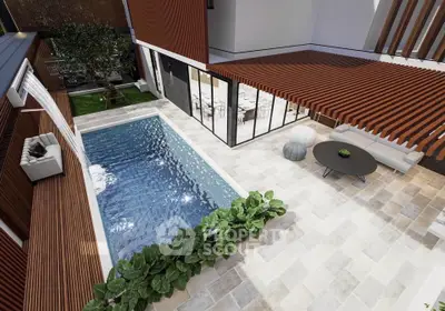 Luxurious modern home with private pool and stylish outdoor seating area.