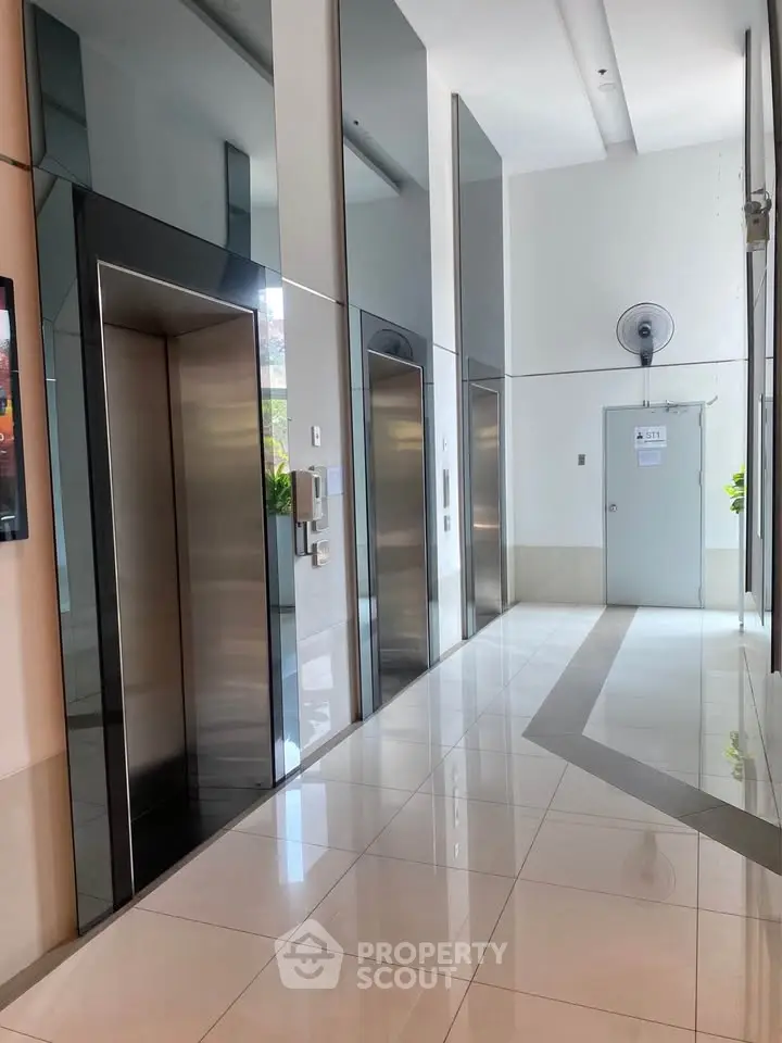 Modern building elevator lobby with sleek design and polished floors
