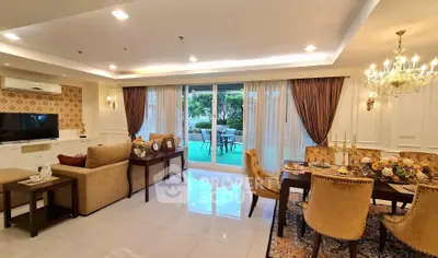 Luxurious living room with elegant dining area and garden view