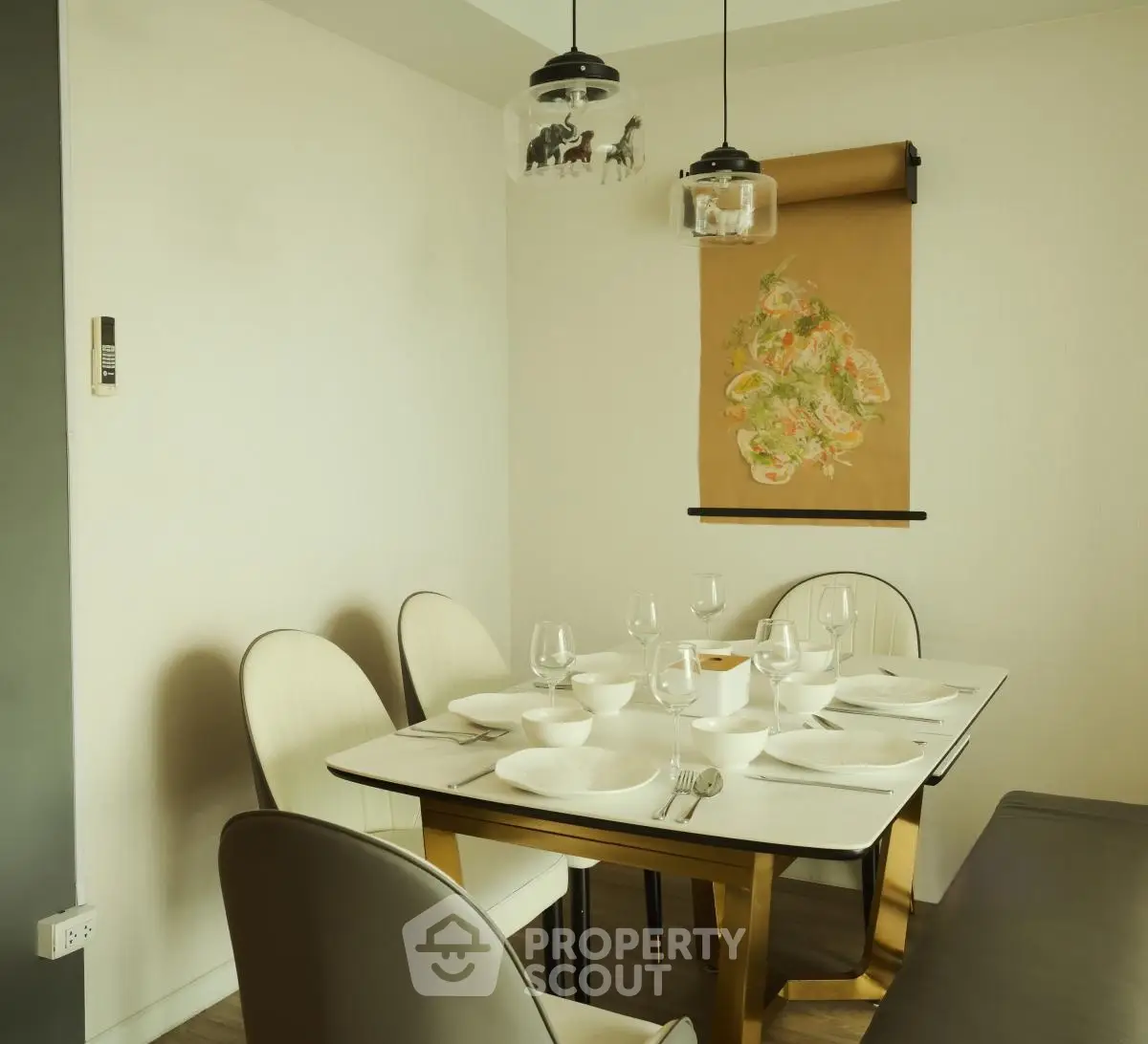 Elegant dining area with modern decor and stylish lighting