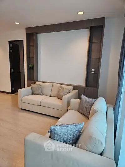 Modern living room with cozy sofas and elegant decor