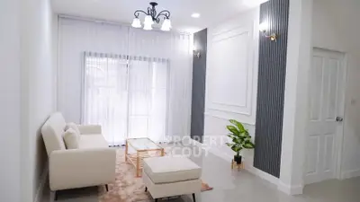 Elegant living room with modern decor and natural light