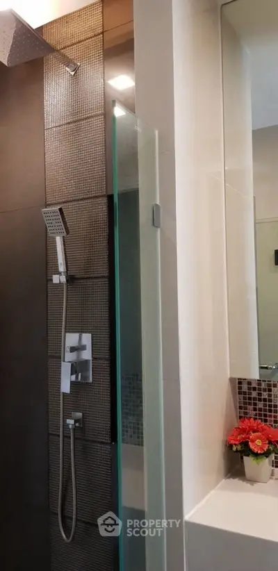 Modern bathroom with sleek shower design and elegant tile work