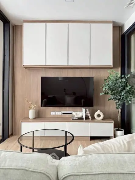 Modern living room with sleek TV setup and stylish decor