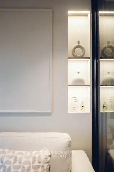 Modern living room with elegant decor and stylish shelving