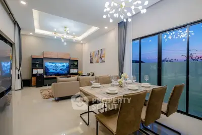 Luxurious modern living room with elegant dining area and stunning evening view.