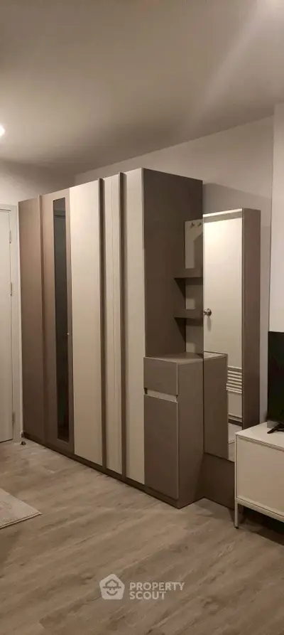 Modern wardrobe with sleek design in a stylish bedroom setting