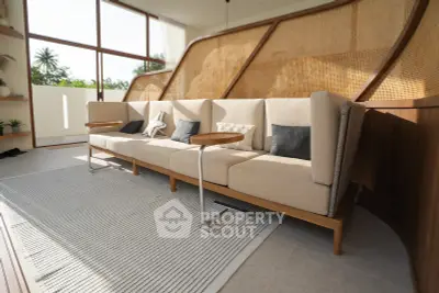 Luxurious modern living room with stylish sofa and natural light