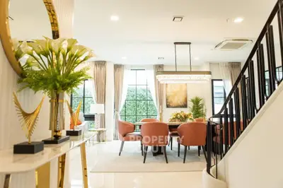 Luxurious open-plan living room with elegant decor and stylish furniture