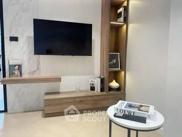 Modern living room with sleek TV setup and stylish decor