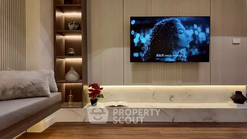 Stylish modern living room with built-in TV and elegant decor
