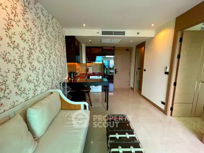 Stylish living room with open kitchen and elegant decor in modern apartment