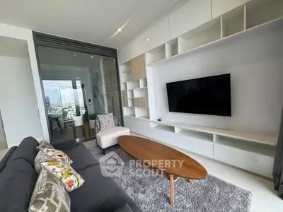 Modern living room with sleek furniture and city view