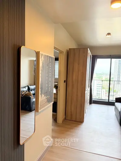 Modern apartment interior with stylish decor and balcony view