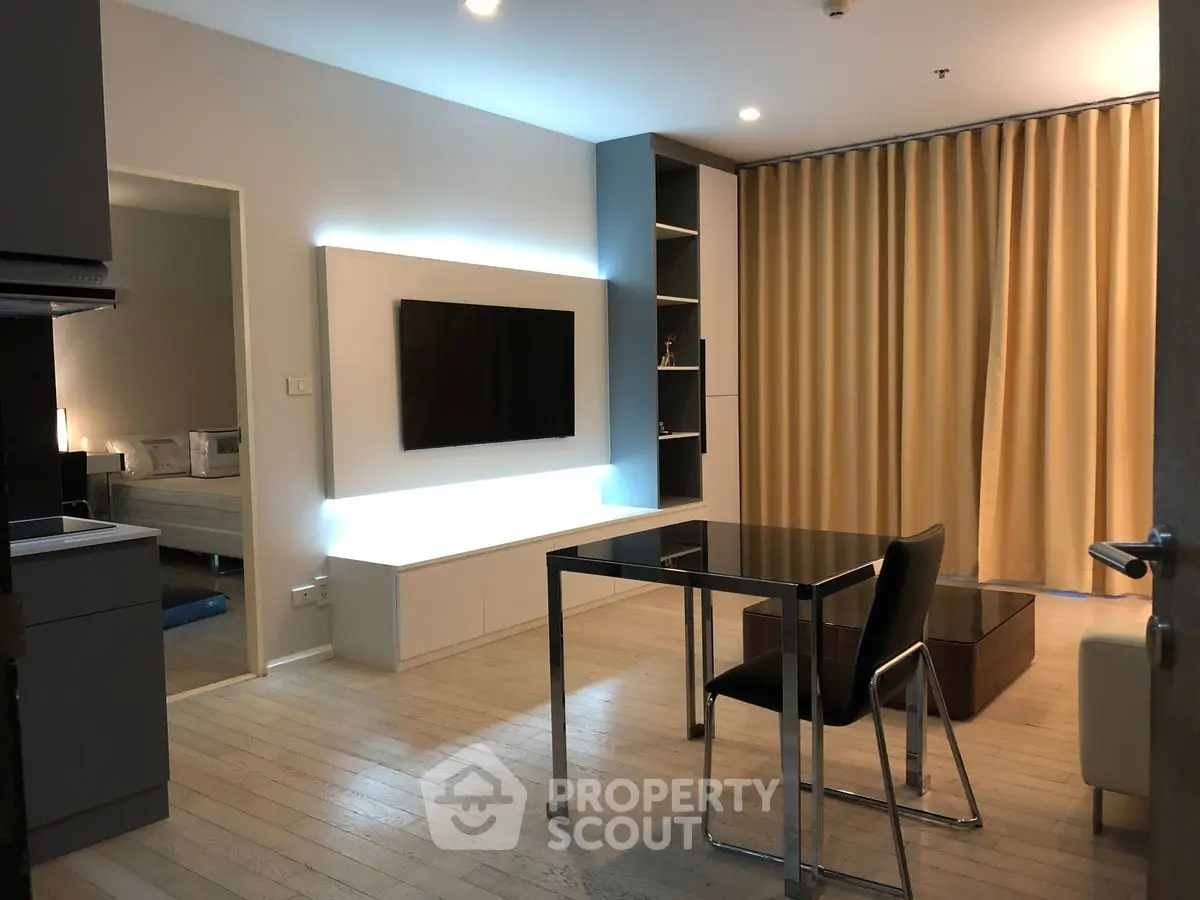 Modern living room with sleek furniture and ambient lighting