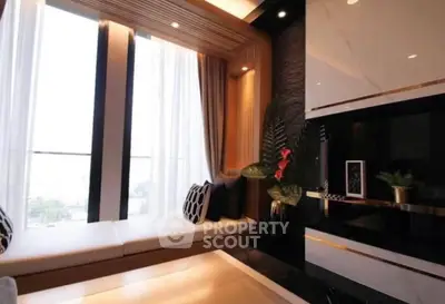 Luxurious modern living room with large windows and elegant decor