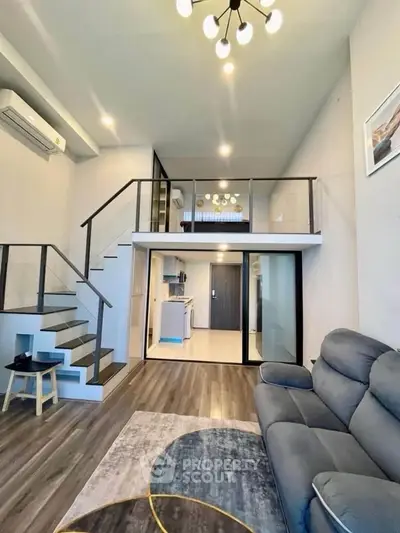 Modern loft apartment with stylish mezzanine and cozy living area