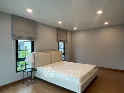 Spacious modern bedroom with elegant design and natural light