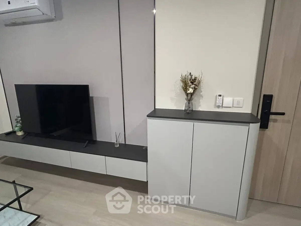 Modern living room with sleek TV unit and stylish decor