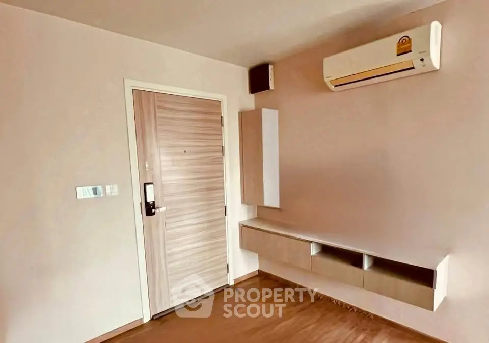 Modern apartment entrance with air conditioning and storage unit