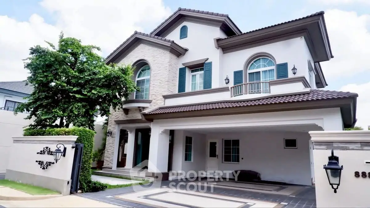 Elegant two-story house with modern design and spacious driveway