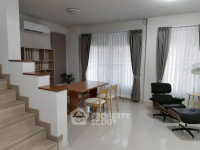 Modern living room with elegant furniture and natural light