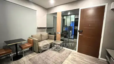 Modern living room with cozy sofa and dining area in stylish apartment