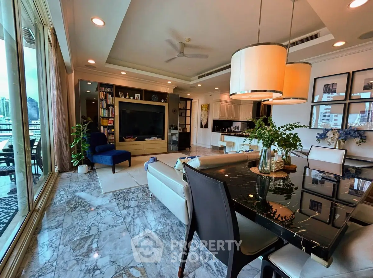 Luxurious living room with marble floors, modern furniture, and city view from large windows.