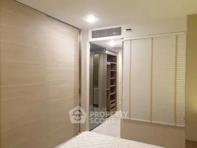 Modern bedroom with built-in storage and sleek design