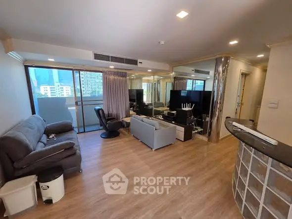 Spacious modern living room with city view and stylish decor