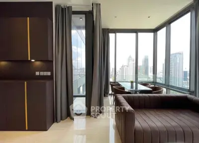 Luxurious corner unit with panoramic city views and elegant interior design.