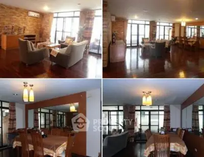 Spacious living and dining area with elegant wooden flooring and ample natural light.