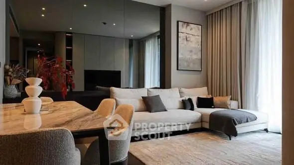 Elegant living room with modern decor and cozy seating area.